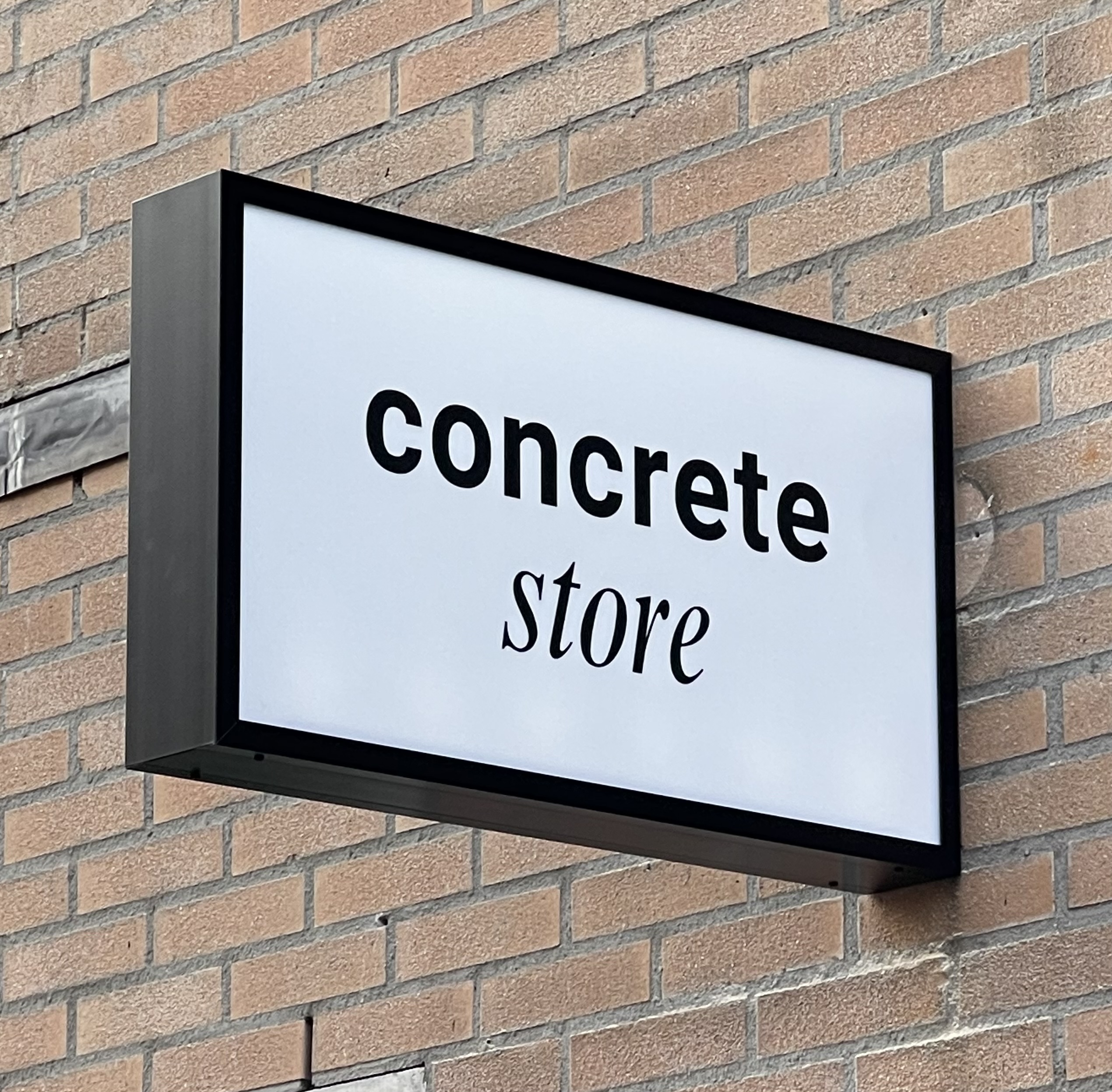led verlicht uithangbord concrete store amsterdam